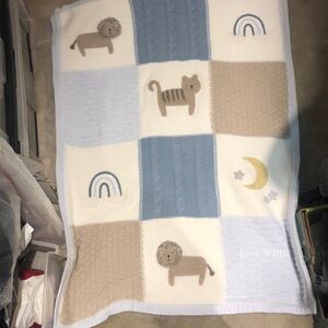 Pottery barn kids beautiful “sweater look” blanket with Sherpa backing.